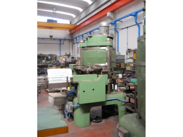 Aggraffatrice automatica per lattine e barattoli