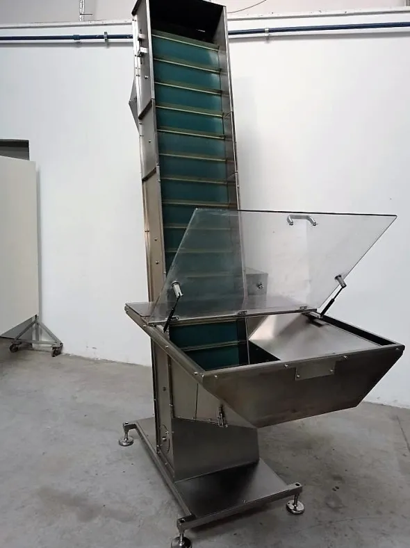 ELEVATORE A TRAMOGGIA PER TAPPI