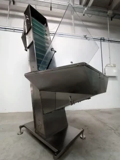 ELEVATORE A TRAMOGGIA PER TAPPI