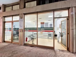 #23005 Fabbricato con unità direzionali, commerciali e residenziali