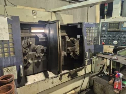 Hwacheon ECO-2SP3 · 1995 - Tornio CNC bimandrino usato
