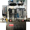 Imbottigliatrice automatica per tappo corona
