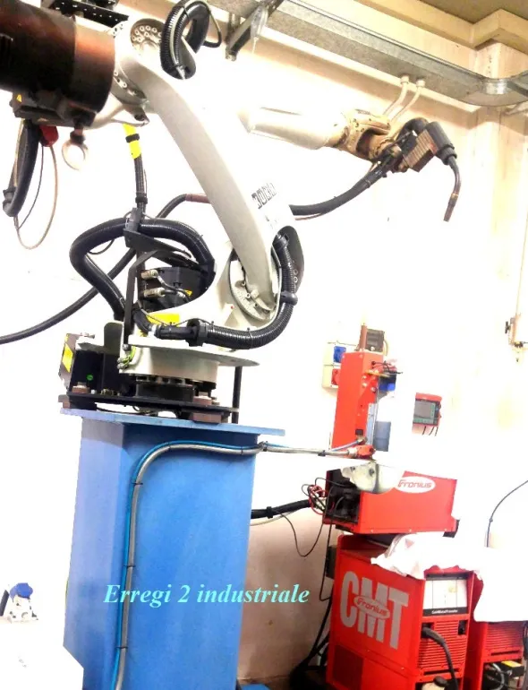 Isola Robot Kuka con saldatrice Fronius CMT, testata