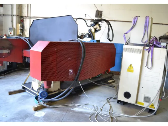 ISOLE DI SALDATURA COMAU CON ROBOT SMART S2 C3G