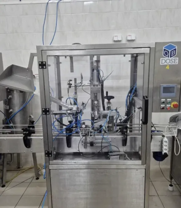 Linea di riempimento e tappatura bottigliea 2000 ml