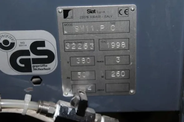 42#4318 Macchina per confezionamento OMF SKF e nastratrici Siat