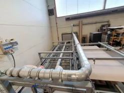 Macchina per la produzione di pannelli in cartongesso