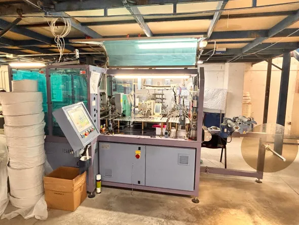 MACCHINA PER MANIGLIE APPLICAZIONE AUTOMATICA