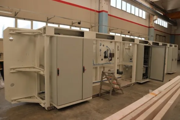 7#7251 Macchinario per produzione assorbenti e magazzino materie prime