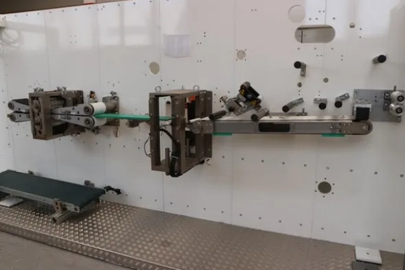 7#7251 Macchinario per produzione assorbenti e magazzino materie prime