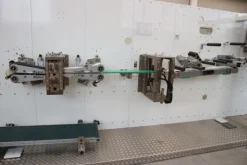 7#7251 Macchinario per produzione assorbenti e magazzino materie prime