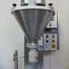 Riempitrice semiautomatica a peso per polveri e granuli