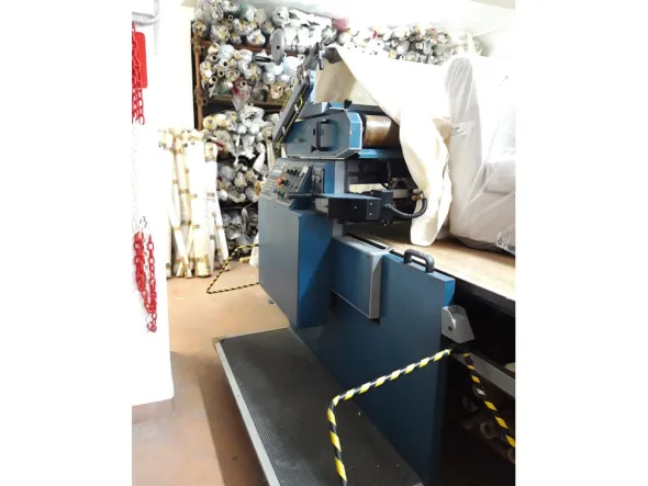 Stenditore automatico e tavolo taglio in ottime condizioni