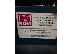 Stenditore automatico e tavolo taglio in ottime condizioni