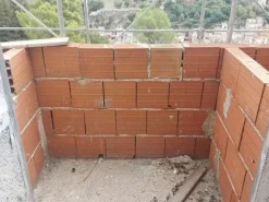 #14605 Terreno edificabile con edificio residenziale in costruzione